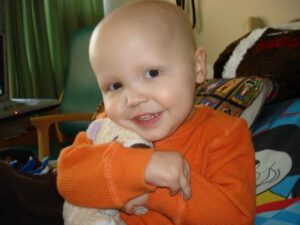 Nicholas Hugging Bear